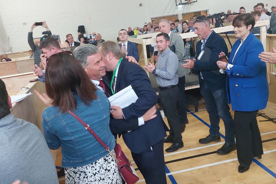 Breandán Fitzgerald (right) commiserates with party colleague Michael O'Shea at the count centre.