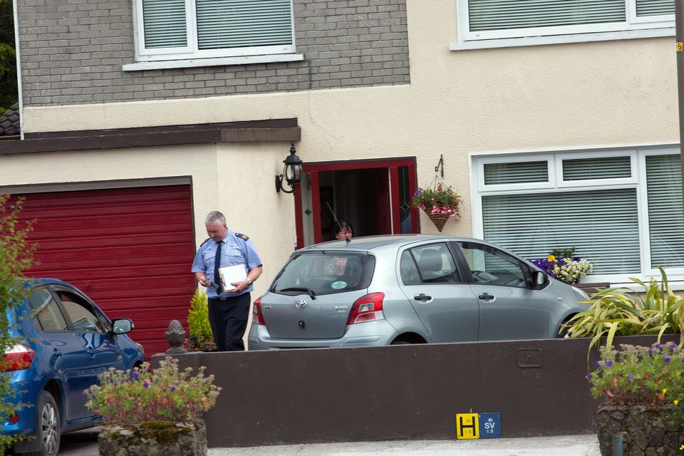 Gardai arrive at the Hayes family home in Athlone