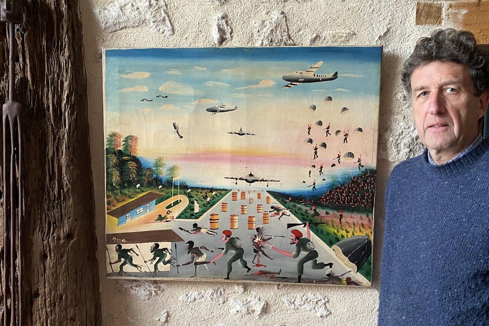 Parachutists jumping – David Orr beside his African painting at home in France