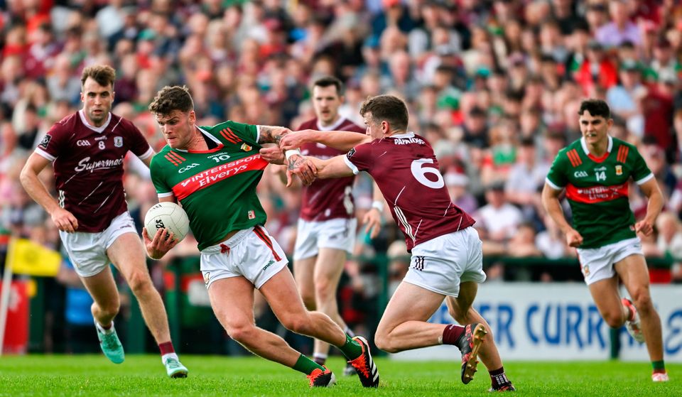 Mayo's Jordan Flynn in action against Galway's John Daly during the Connacht SFC final at Pearse Stadium in Galway.  Photo: Daire Brennan/Sportfile