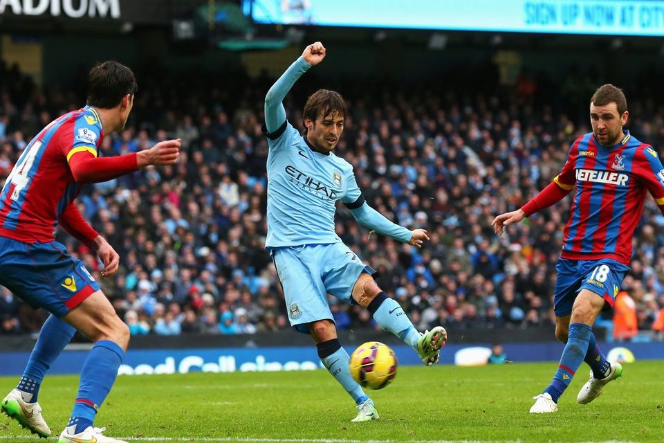 David Silva scores Manchester City's second goal during their Premier League clash with Crystal Palace at the Etihad. Photo: Alex Livesey/Getty Images