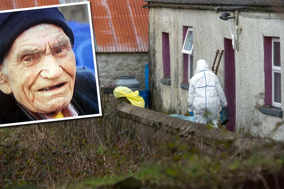 Garda forensics officers search for evidence at the home of the 90-year-old farmer Picture: Provision