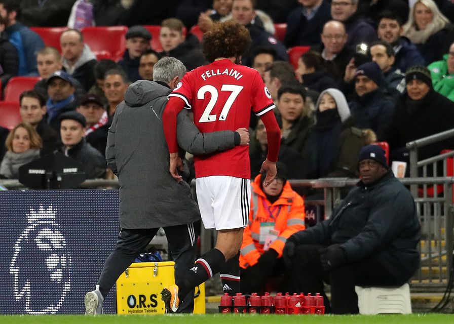 Marouane Fellaini went off injured at Wembley