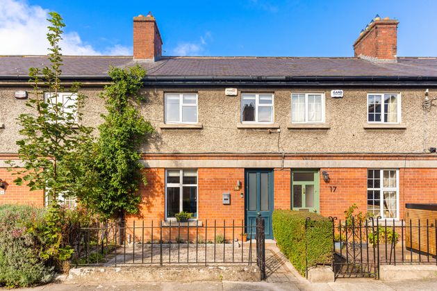 Extended 1920s terrace near Rathfarnham Castle pairs period character with contemporary design