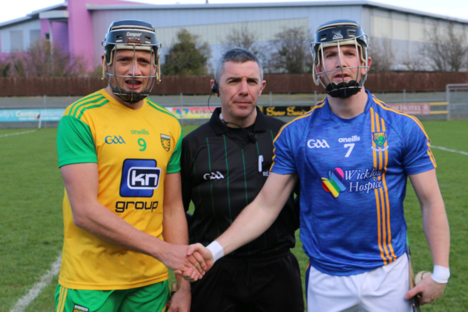 Donegal’s Danny Cullen and Wicklow’s Warren Kavanagh shake hands before throw in