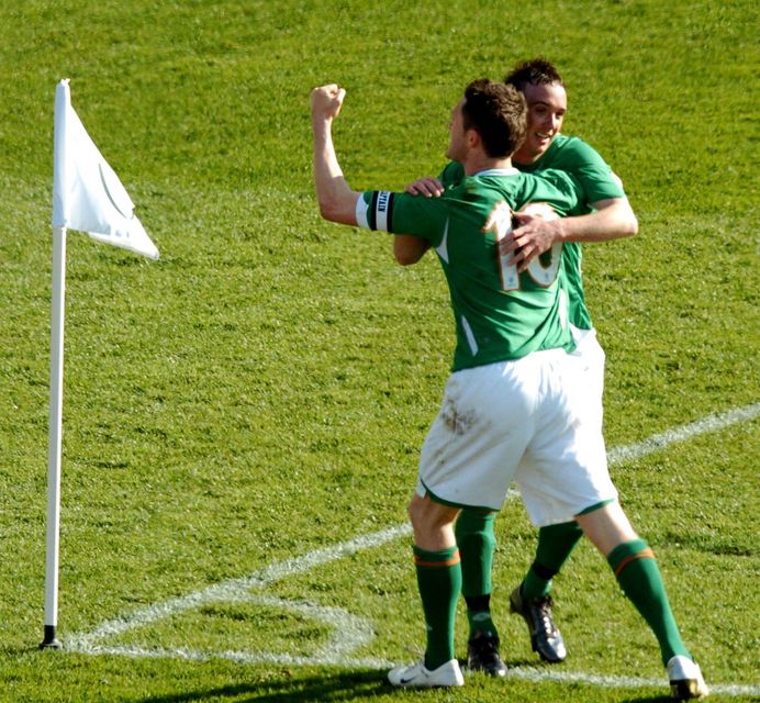 Stephen Ireland celebrates with team-mate Robbie Keane after scoring the winner against Wales in 2007. Photo: Sportsfile