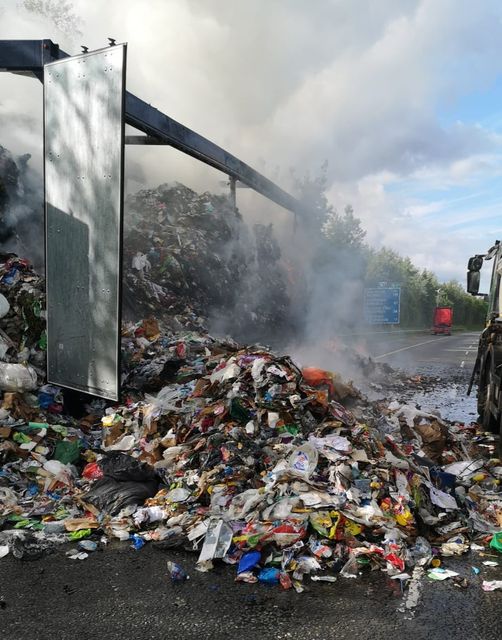 Firefighters battling a blaze on the M1 this evening. Photo: Dublin Fire Brigade.