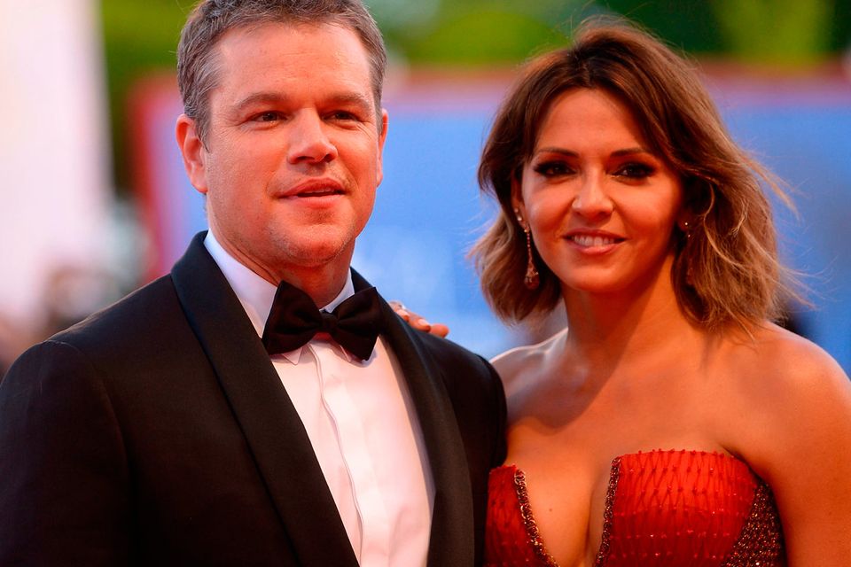 US actor Matt Damon and his wife Luciana Barroso arrive for the opening ceremony of the 74th Venice Film Festival and the premiere of the movie "Downsizing", on August 30, 2017 at Venice Lido.  / AFP PHOTO / Filippo MONTEFORTEFILIPPO MONTEFORTE/AFP/Getty Images
