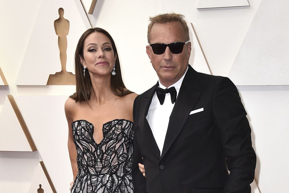 Christine Baumgartner and Kevin Costner (Invision/AP)