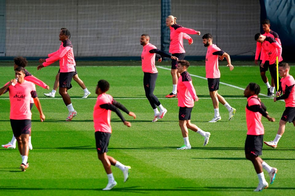 Manchester City players during a training session at City Football Academy before the start of their Champions League defence. Photo: Martin Rickett/PA