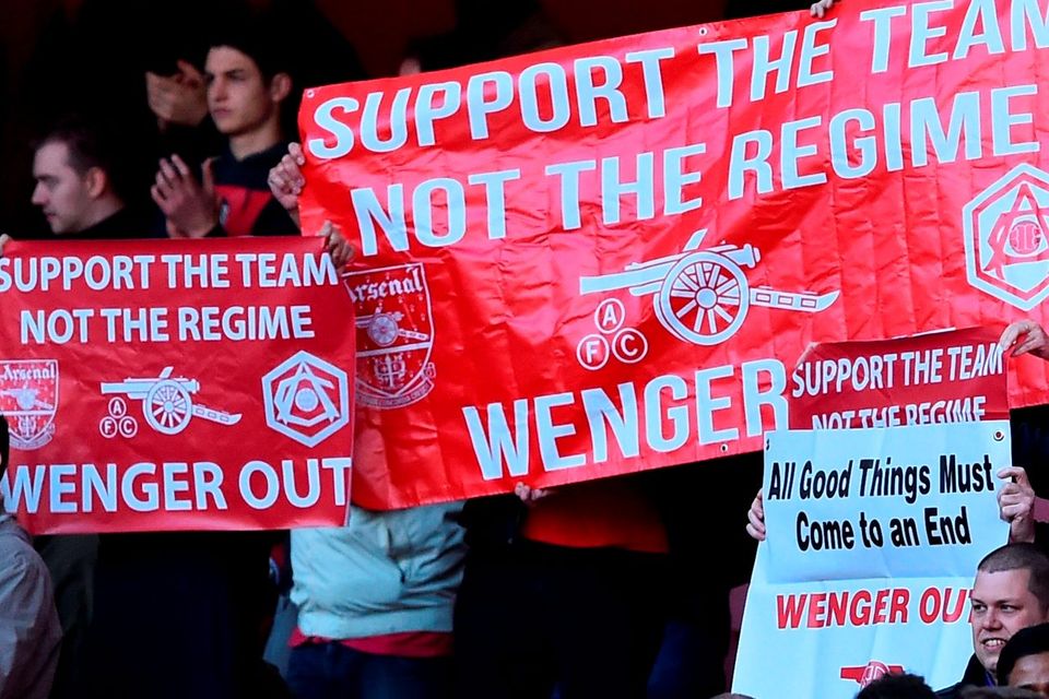 Arsenal fans hold up banners calling for "Wenger Out". Photo: Getty
