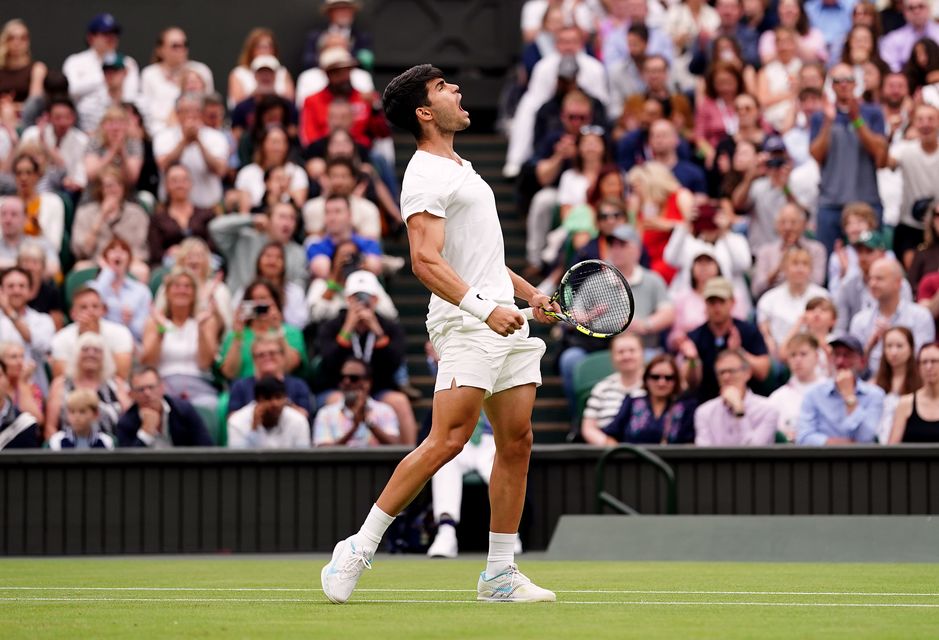 Carlos Alcaraz lets out a roar (Zac Goodwin/PA)