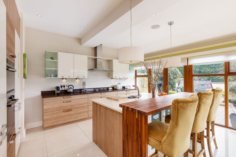 The kitchen with its hardwood breakfast counter