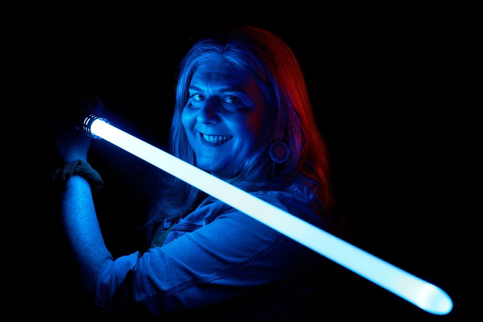 ‘Star Wars is that thing that is consistent in my life’: Becky Cheatle with her lightsaber. Photo: Steve Humphreys