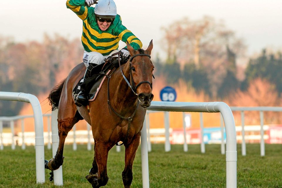 8 February 2015; Carlingford Lough, with Tony McCoy up, cross the finish line to win the Hennessy Gold Cup. Leopardstown, Co. Dublin. Picture credit: Cody Glenn / SPORTSFILE