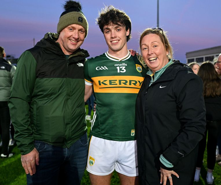 Luke Crowley of Kerry celebrates with his parents Marie and father John, former Kerry footballer, after the Munster U-20 Football Championship Final