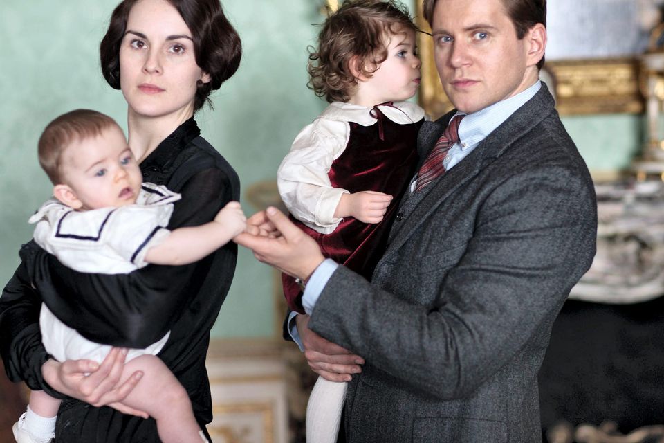 Lady Mary played by Michelle Dockery with Baby George and Tom Branson played by Allen Leech with baby Sybbie - after five successful series, Julian Fellowes's hit drama 'Downton Abbey' will return for a sixth series, ITV and Carnival Pictures have announced