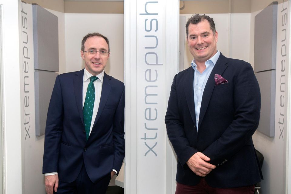 Minister for Enterprise, Trade and Employment Robert Troy speaks with Tommy Kearns, CEO of Xtremepush, at the company's new headquarters in Clarendon Street, Dublin. Photo: Julien Behal Photography