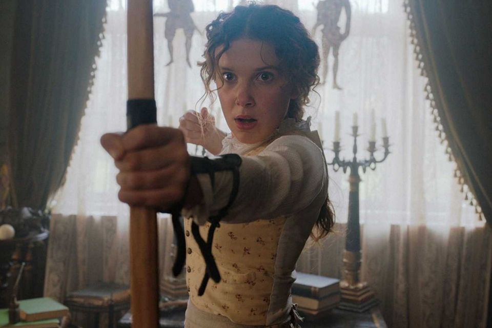Taking aim: Millie Bobby Brown as Enola Holmes in the new Netflix film