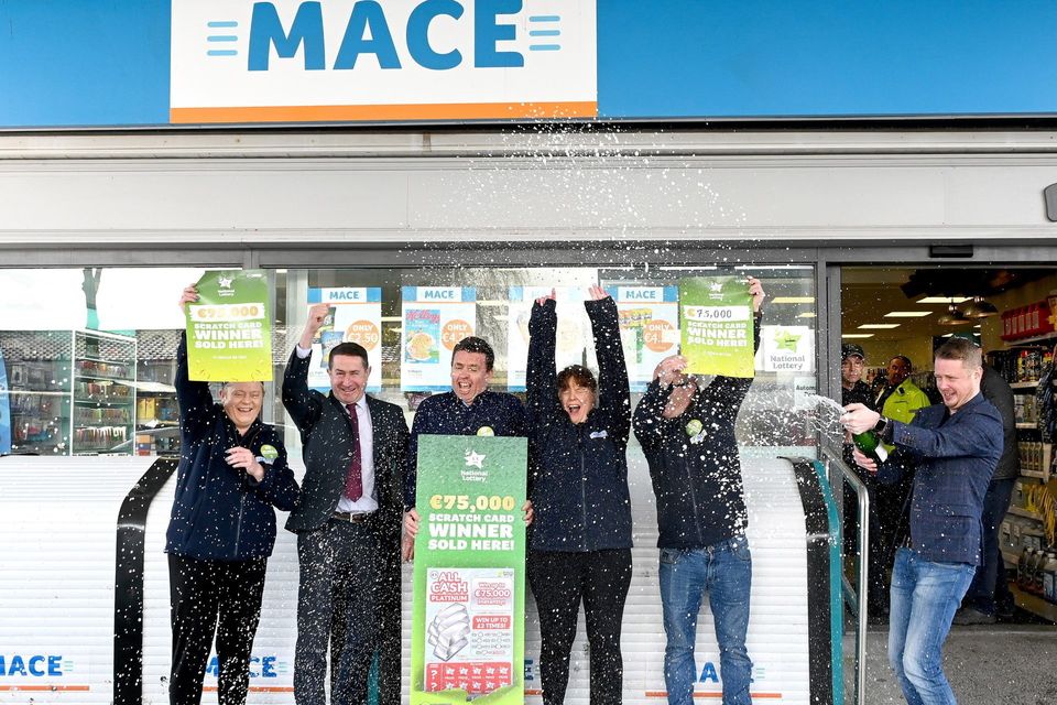 Staff at the Mace store at the Borris Service Station in Co Carlow celebrating the sale of the winning scratch card