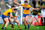 thumbnail: Kerry's Paul Murphy is tackled by Clare's Ronan Lanigan (left) during the Munster SFC final at Cusack Park in Ennis on Sunday. Photo: John Sheridan/Sportsfile