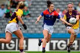 thumbnail: New York's Ciara Scally in action against Wexford's Catriona McCabe. Brendan Moran / SPORTSFILE