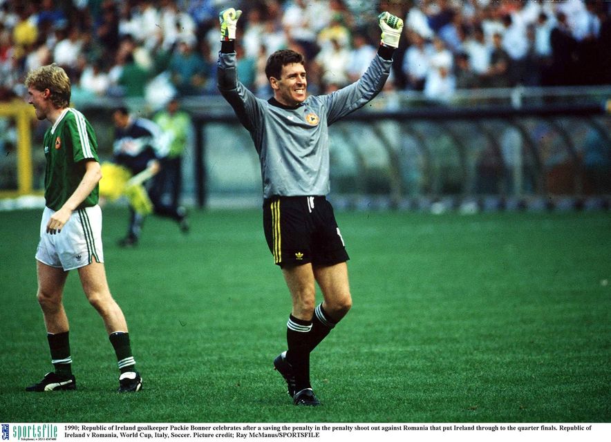 1990; Republic of Ireland goalkeeper Packie Bonner celebrates after a saving the penalty in the penalty shoot out against Romania that put Ireland through to the quarter finals. Republic of Ireland v Romania, World Cup, Italy, Soccer. Picture credit; Ray McManus/SPORTSFILE