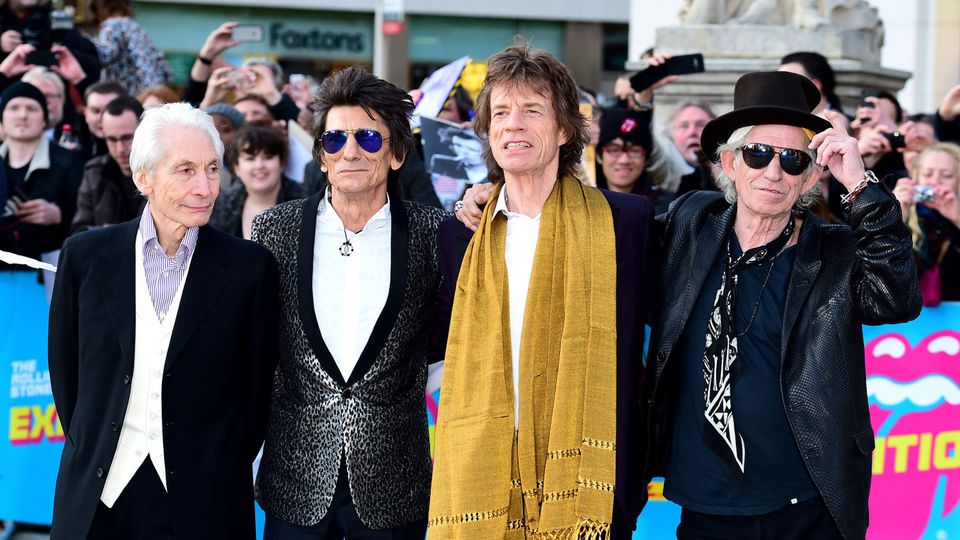 (L-R) Charlie Watts, Ronnie Wood, Mick Jagger and Keith Richards of The Rolling Stones arriving for the opening night gala for Exhibitionism: The Rolling Stones exhibition held at the Saatchi Gallery, London.
