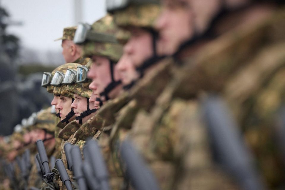 Graduating officers of the National Guard Military Academy attend a ceremony marking the 9th anniversary of the National Guard of Ukraine, amid Russia's attack on Ukraine, at a compound of the World War II Museum in Kyiv, Ukraine March 24, 2023. Photo: Ukrainian Presidential Press Service/Handout via REUTERS