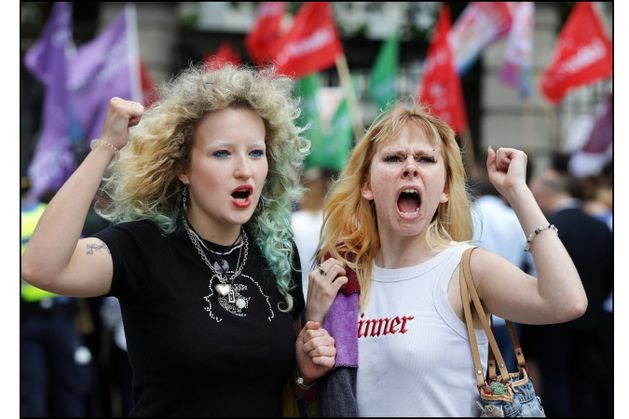 Students and opposition politicians have staged a protest outside Leinster House, calling for more clarity on the rate of fees they will be paying
