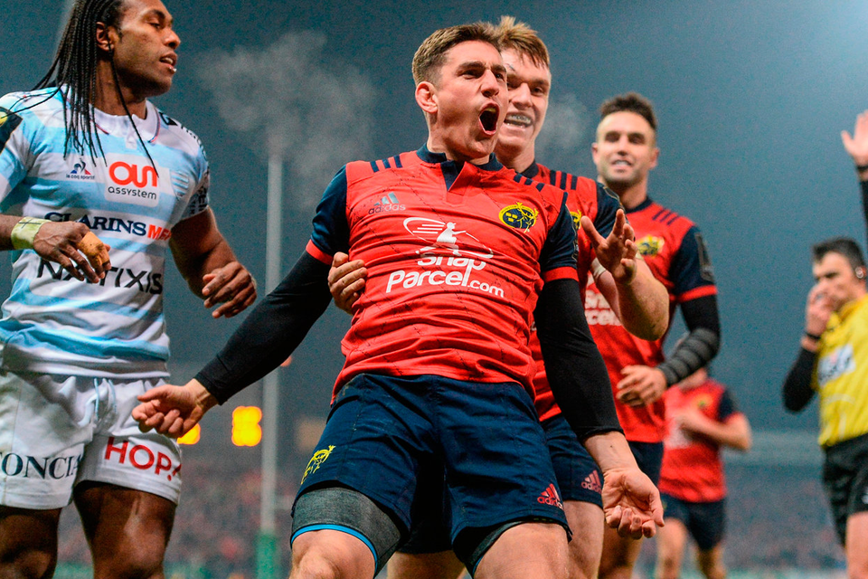 Ian Keatley celebrates with Rory Scannell after scoring Munster’s third try against Racing 92 on Saturday. Photo by Diarmuid Greene/Sportsfile