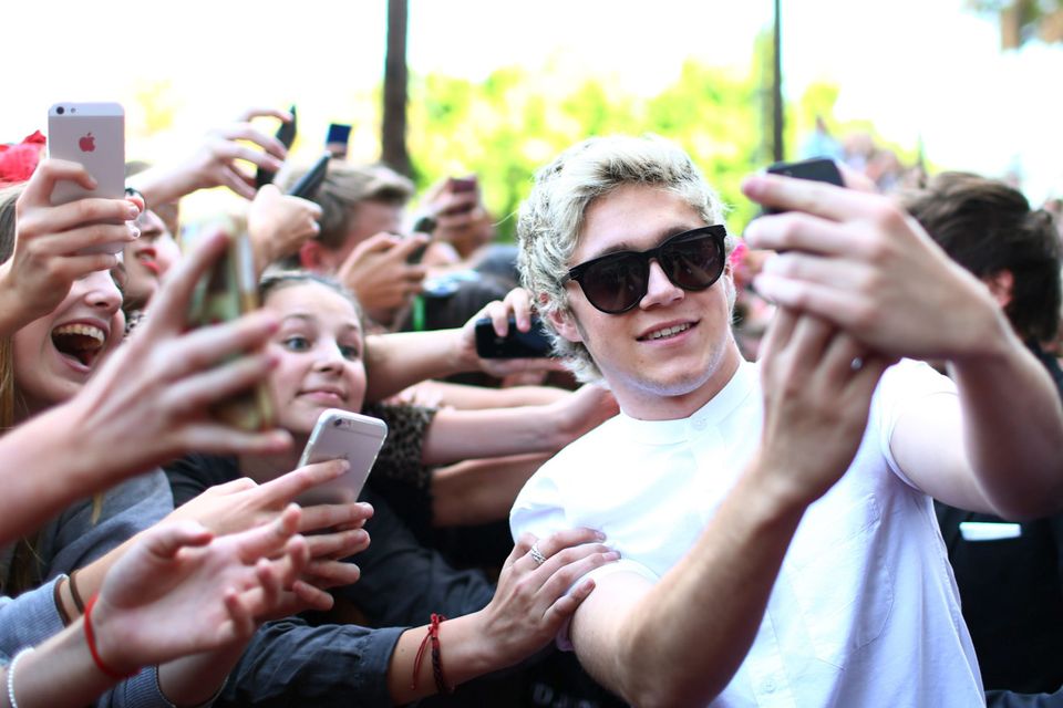 Niall Horan poses with fans at the 28th Annual ARIA Awards 2014 at the Star on November 26, 2014 in Sydney