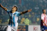 thumbnail: Argentina's Sergio Aguero celebrates after scoring a goal as Paraguay's Ivan Piris looks on during their Copa America 2015 semi-final soccer match at Estadio Municipal Alcaldesa Ester Roa Rebolledo in Concepcion, Chile, June 30, 2015. REUTERS/Andres Stapff
