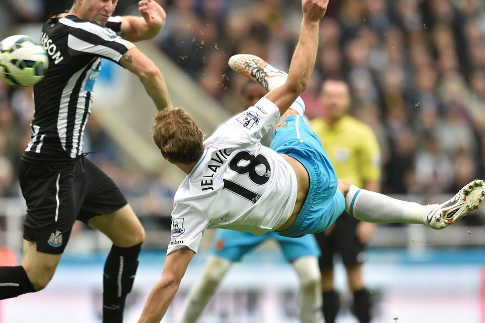 Hull's Nikica Jelavic scores during the Barclays Premier League match at St James' Park, Newcastle. Photo credit: Owen Humphreys/PA Wire