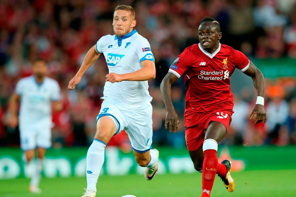 Liverpool’s Sadio Mane shows Hoffenheim’s Pavel Kaderabek a clean pair of heels at Anfield last night. Photo by Jan Kruger/Bongarts/Getty Images