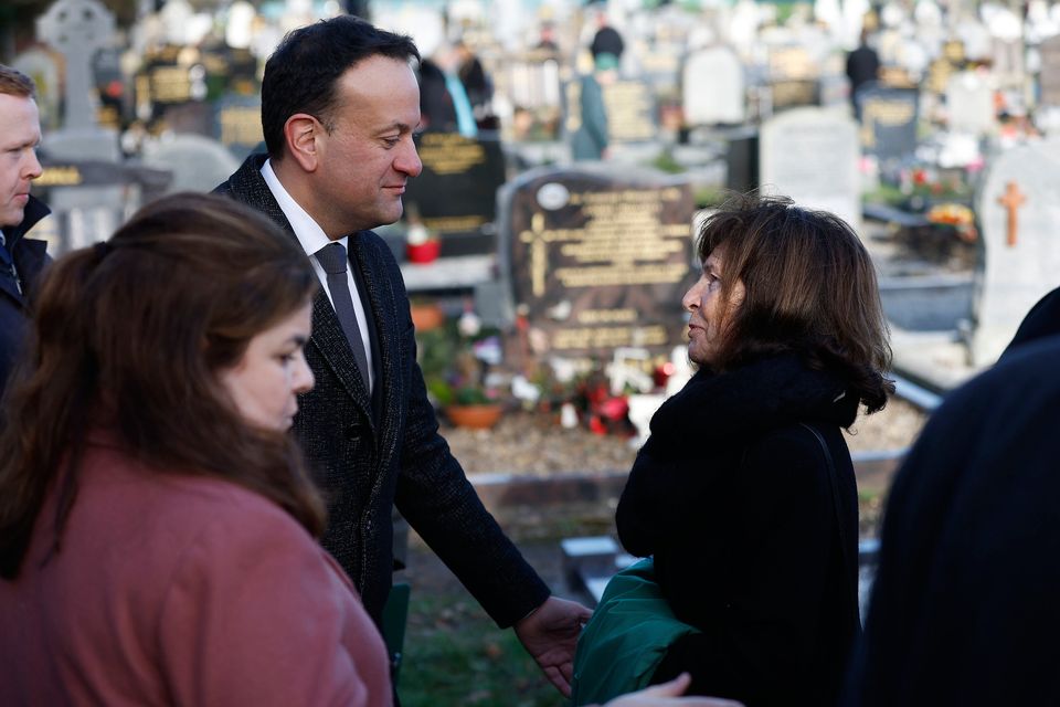 Taoiseach Leo Varadkar speaks with John Bruton's widow Finola before the coffin of the former taoiseach is interred at Rooske Cemetery in Dunboyne. Picture by Julien Behal