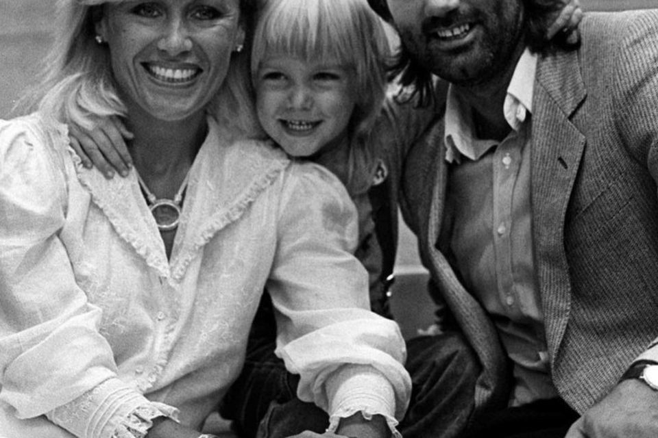 A young Calum Best with his parents Angie and George.