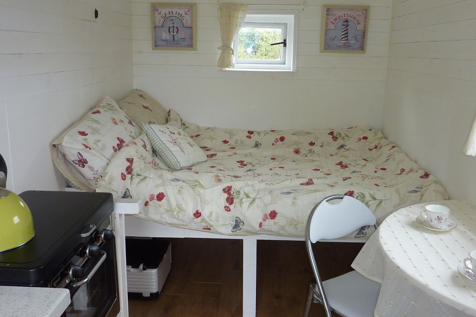 Nick Newman rents out The Nook, a fully-insulated hut on wheels, complete with double bed, sink, table, chairs and stove