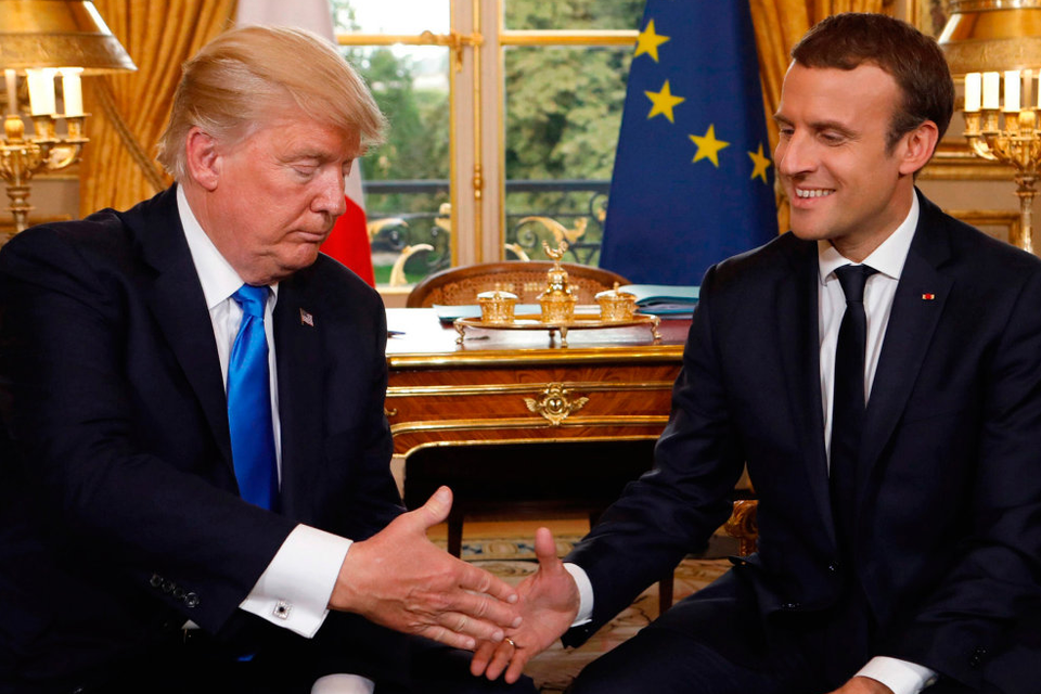 Shake it, baby: French President Emmanuel Macron and US President Donald Trump shake hands as they meet at the Elysee Palace in Paris last Thursday Photo: Kevin Lamarque