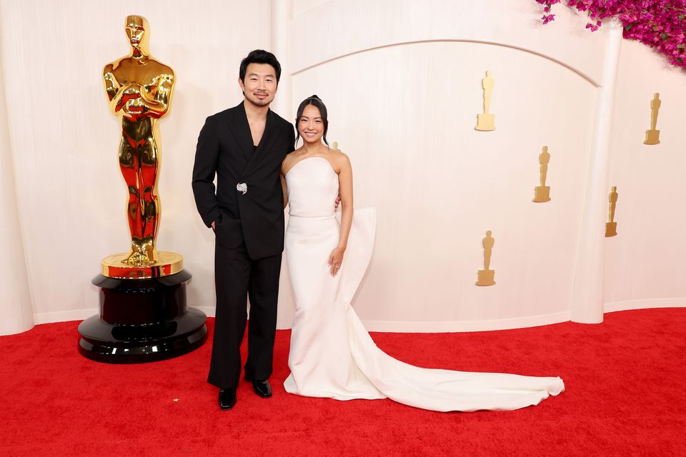 Simu Liu and Allison Hsu attend the 96th Annual Academy Awards on March 10, 2024 in Hollywood, California. (Photo by Mike Coppola/Getty Images)