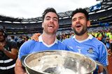 thumbnail: Dublin's Michael Darragh Macauley, left, and Cian O'Sullivan celebrate with the Sam Maguire