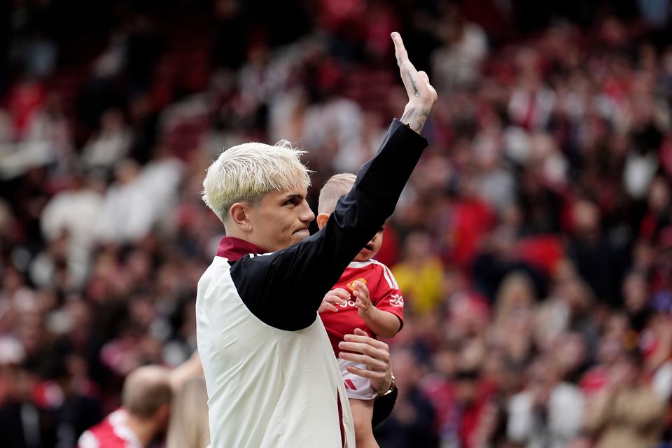 Alejandro Garnacho waves to the Manchester United fans after the match
