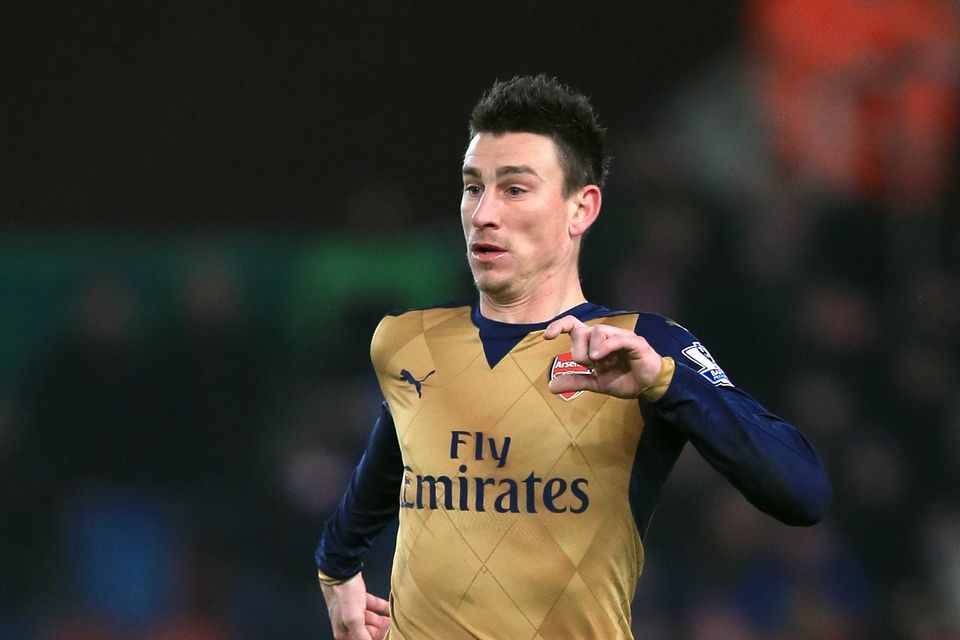 Laurent Koscielny helped keep Bournemouth as bay as Arsenal got back to winning ways on Sunday.