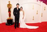 thumbnail: Simu Liu and Allison Hsu attend the 96th Annual Academy Awards on March 10, 2024 in Hollywood, California. (Photo by Mike Coppola/Getty Images)