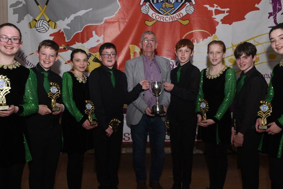 Boherbue Set Dancers, winners at the Co. Scór na nOg Final receive their trophies from Jerome Casey, Treasurer, Cork Scor. Picture John Tarrant
