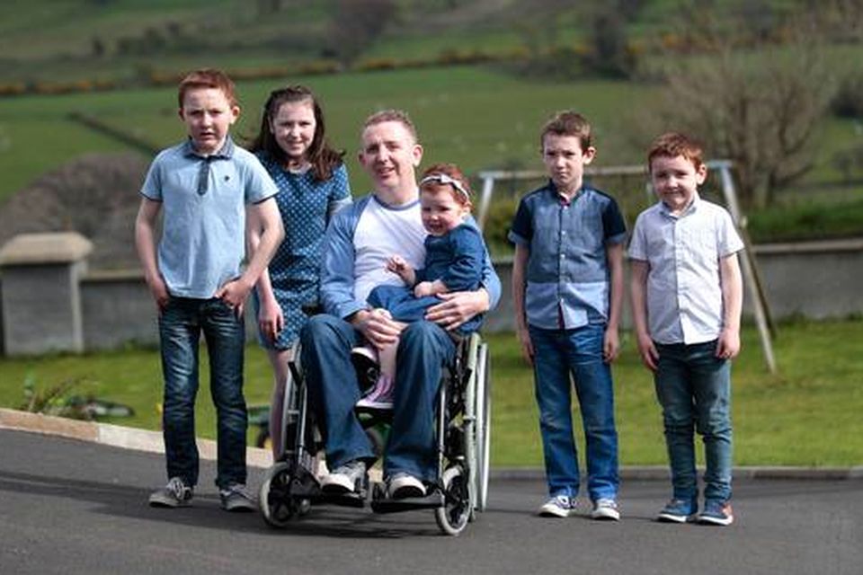 John McNaughton from Glenariff with his kids, Shannon (3), Shea (13), Clodagh (11), Eoin (8) and Ruairi (6). Photo: Belfast Telegraph