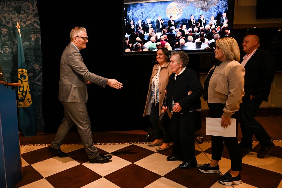 Jarlath Burns greets Bridie Brown, the wife of Sean Brown, and his family at the GAA Congress in Donegal. Photo: Sportsfile