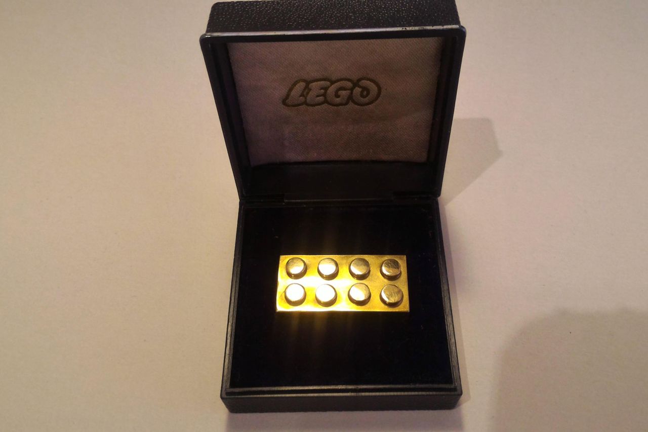 Solid gold best sale lego brick