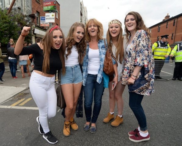 L-R; Caoimhe Cowman, 14, Shona Geoghegan, 15 and her mother Catherine, Lauren Guider, 15, and Molly O'Dwyer, 15, from Carlow, on their way to the Ed Sheeran  concert in Croke Park, Dublin. Picture: Caroline Quinn