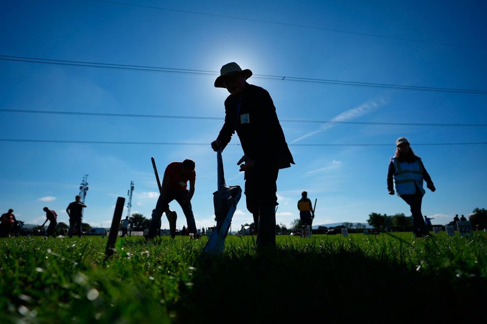 Thomas Cunningham from Galway takes part in the Loy digging competition at the National Ploughing Championships at Ratheniska, Co Laois. Photo: Niall Carson/PA Wire